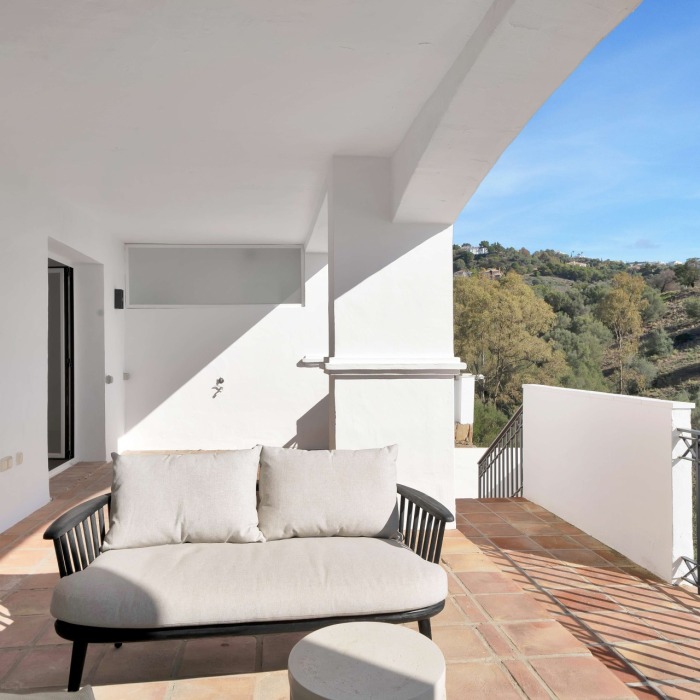 Enchanting Andalusian 2 bedroom apartment in a gated community in Pueblo Los Monteros, Marbella | Image 1