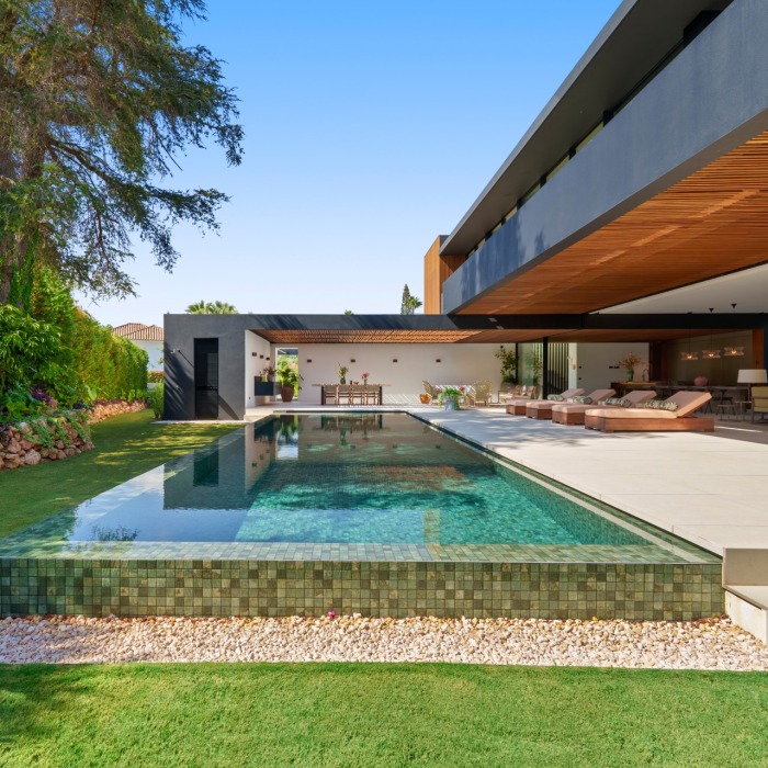 Exquisite Casa Piemonte located within the prestigious gated community of Parcelas del Golf | Image 1