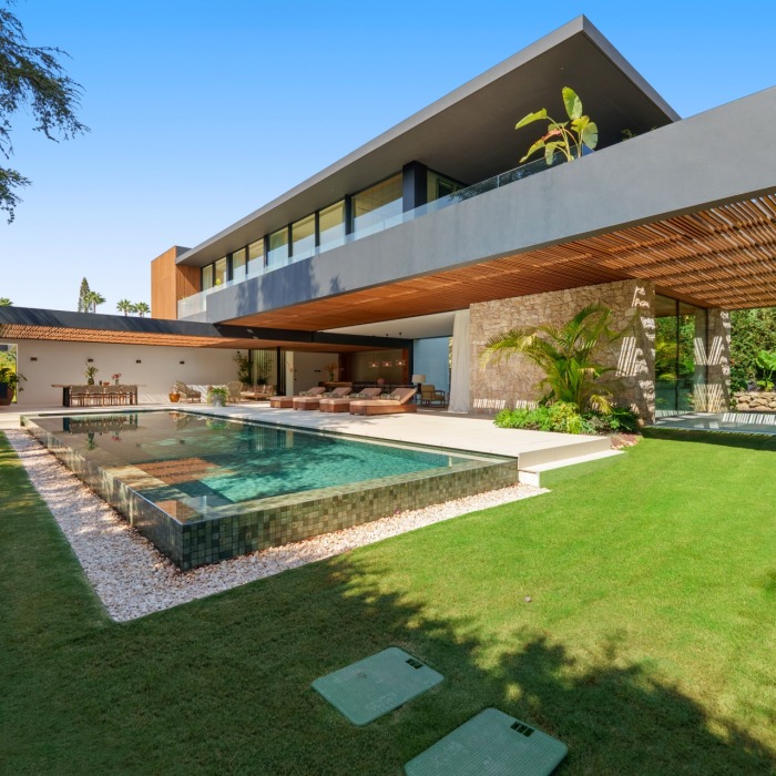 Exquisite Casa Piemonte located within the prestigious gated community of Parcelas del Golf